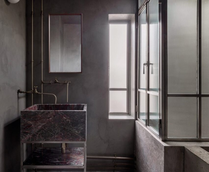 Tranquil bathrooms with dark and soothing interiors