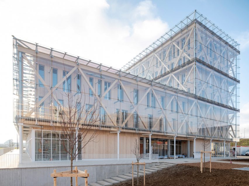 GRAAM Architecture wraps Burgundy office building in timber exoskeleton and “glass veil”