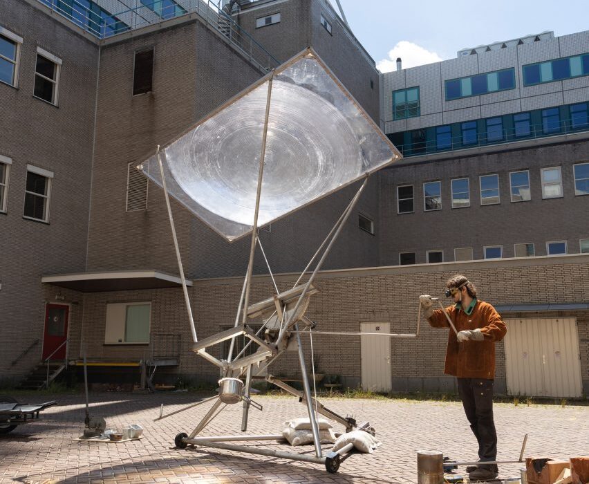 Jelle Seegers uses giant magnifying glass to melt metal