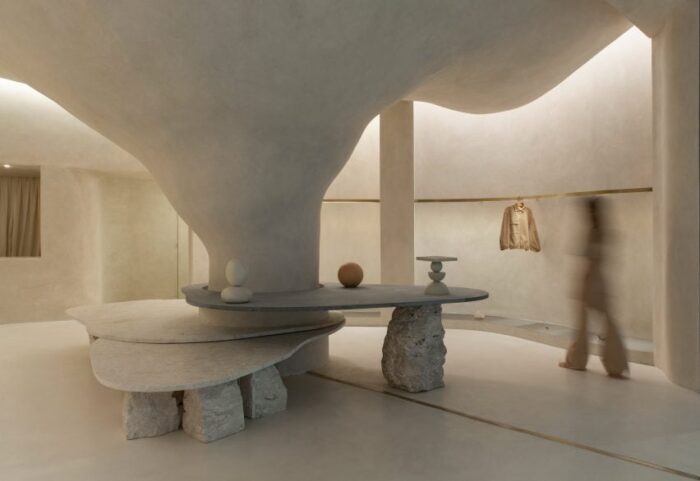 AIA Estúdio designs cave-like interior for clothing store in Rio de ...