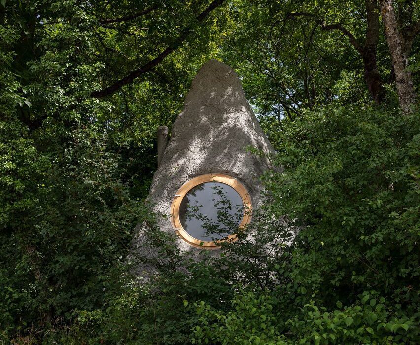 Bureau conceals Thérèse cabin in France with boulder-like concrete finish