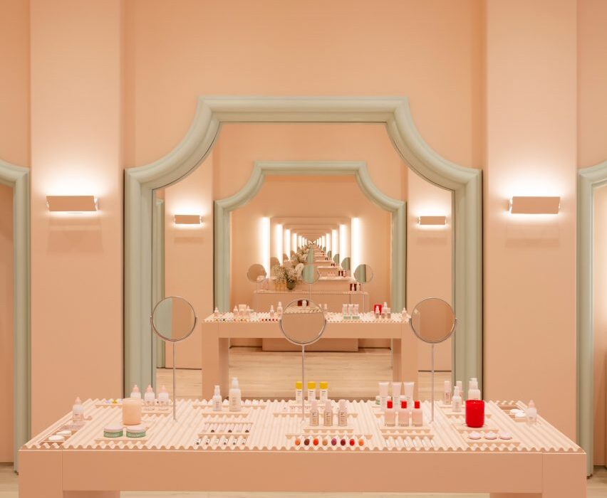 Glossier Boston store features pastel green mouldings