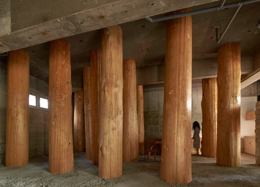 Wooden logs frame Forest Office in Japan by Tomoaki Uno Architects