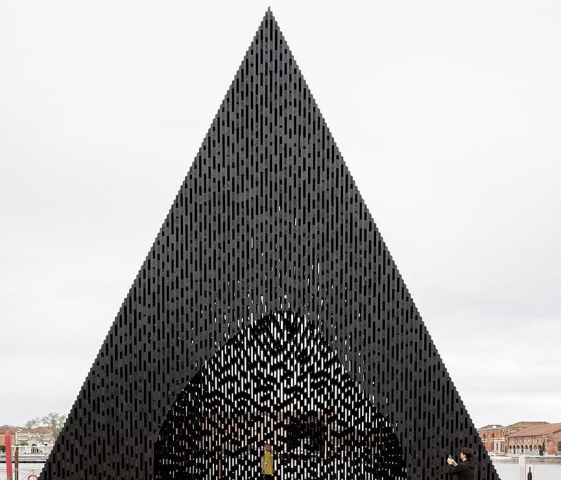 david adjaye’s triangular all-timber pavilion pierces the sky at venice architecture biennale