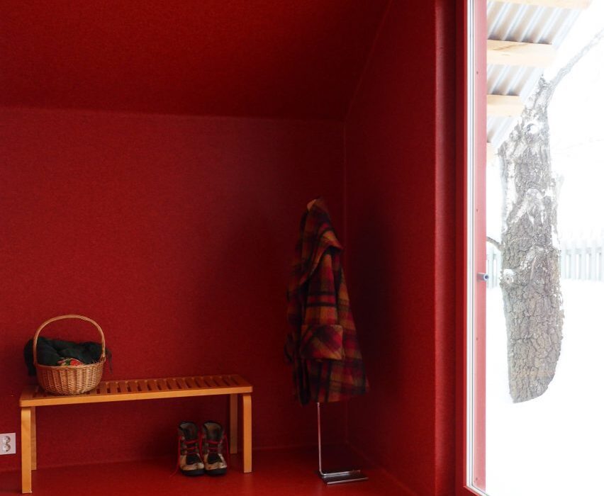 Ten cherry red interiors that make colour their focus