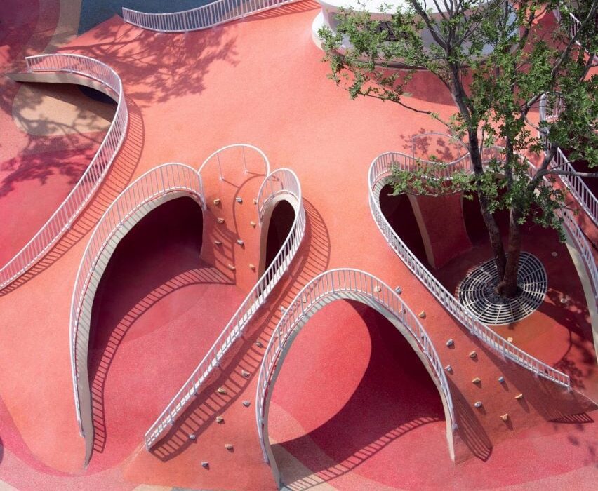 Red Dunes Playtopia features “cave-like” play spaces and undulating hills