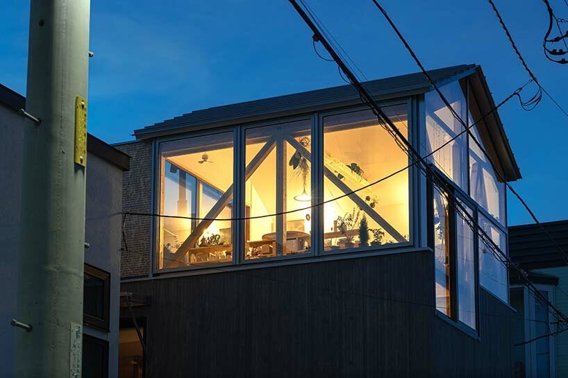 yoshichika takagi tops hokkaido house with ‘greenhouse’ kitchen