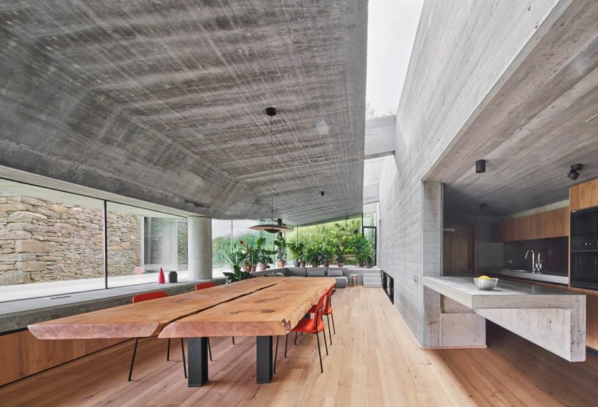 Eight open-plan interiors where dining tables take centre stage