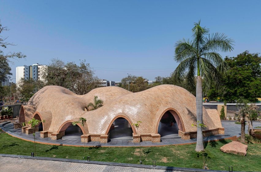 Flowing vaulted roofs top Tarang arts space by The Grid Architects