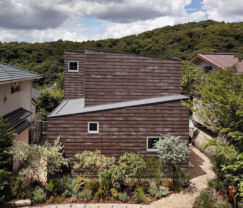 tan yamanouchi’s japanese home unfolds around a spiral staircase