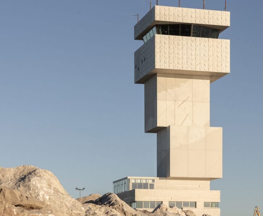 Atelier 9.81 models Calais port tower on stack of pebbles