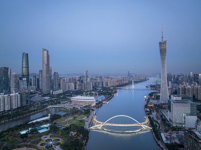 a vibrant social space, haixin bridge curves across pearl river to reconnect guangzhou