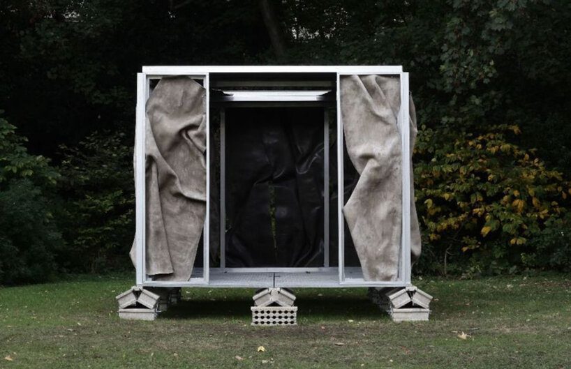 crumpled cement drapes over function-free pavilion X