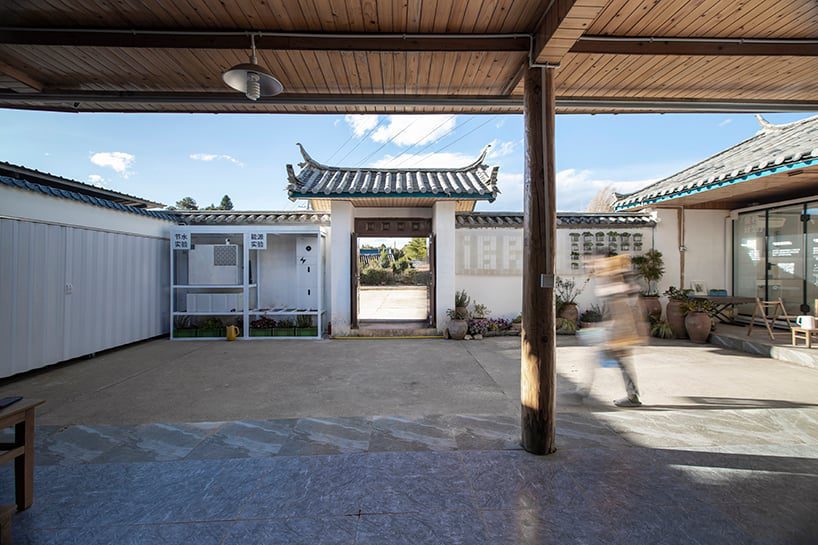 modular cabins made of aluminum and glass embed into village houses in china