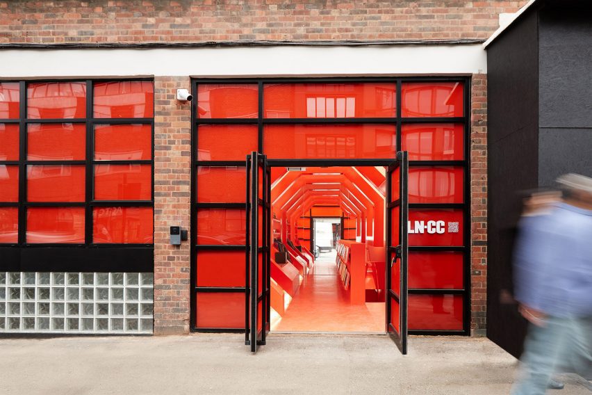 Gary Card redesigns LN-CC store with orange tunnel and LED-lit club